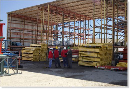 Randy O'Connor works with pallet Racking crew